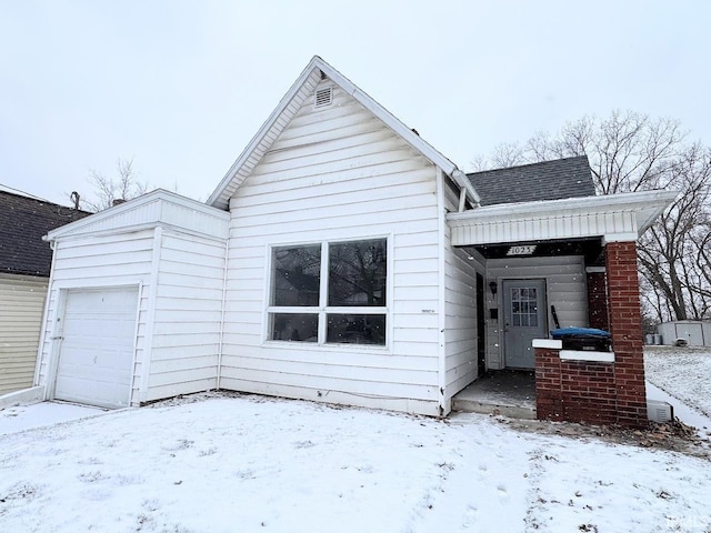 view of front of home with a garage