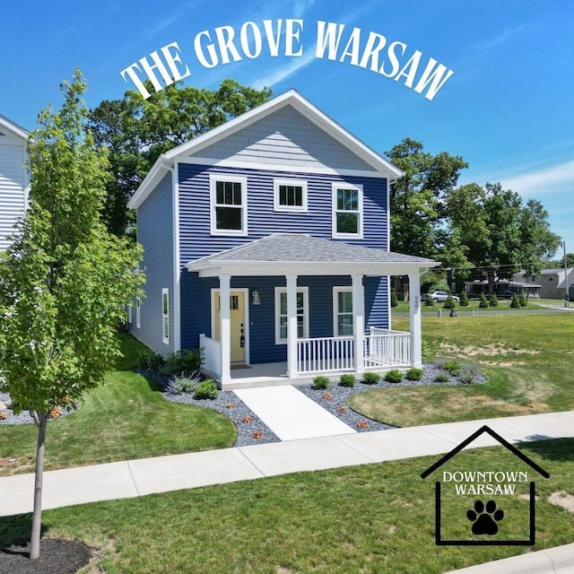 view of front of property with a front yard and covered porch