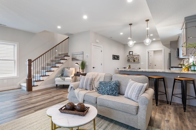 living room with dark wood-type flooring