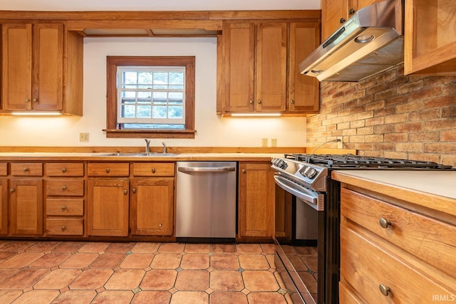 kitchen featuring stainless steel appliances and sink