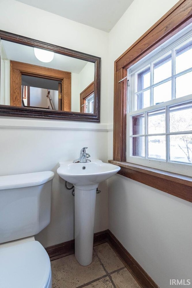 bathroom featuring toilet