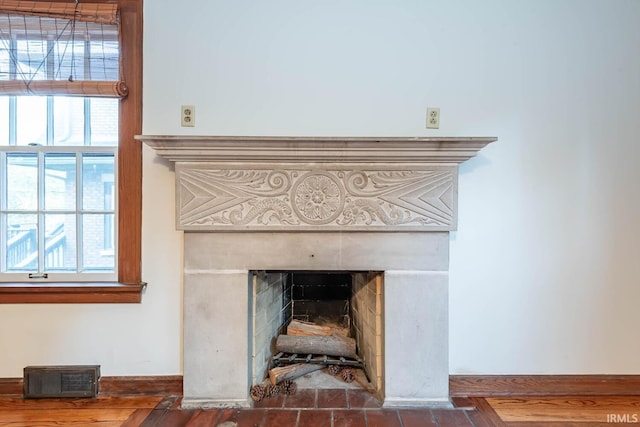 interior details featuring a fireplace