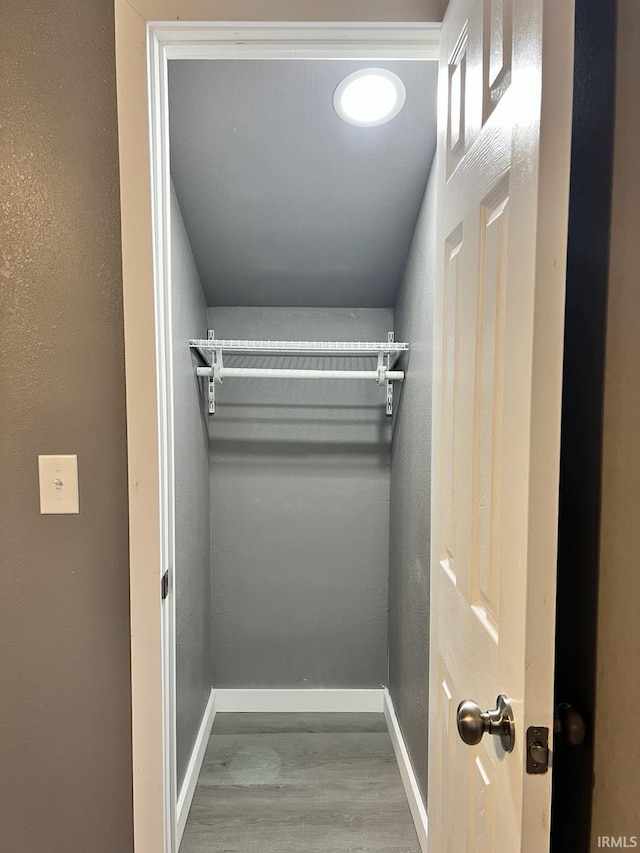 walk in closet featuring light wood-type flooring