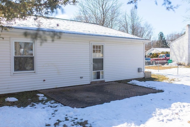 view of snow covered house