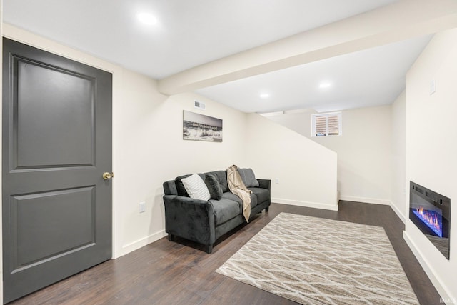 living room with dark wood-type flooring