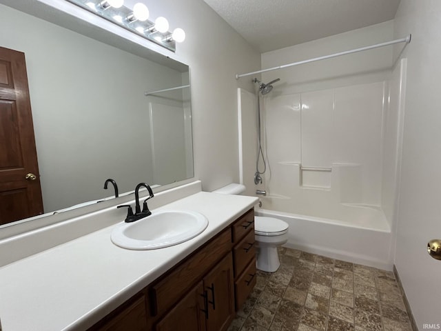 full bathroom featuring vanity, toilet, a textured ceiling, and shower / bath combination