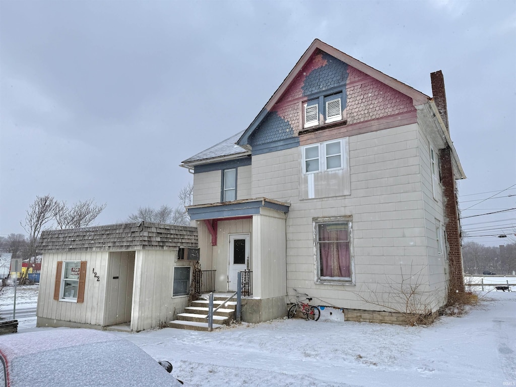 view of snow covered property