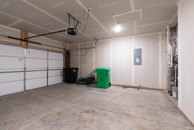 garage featuring a garage door opener and electric panel