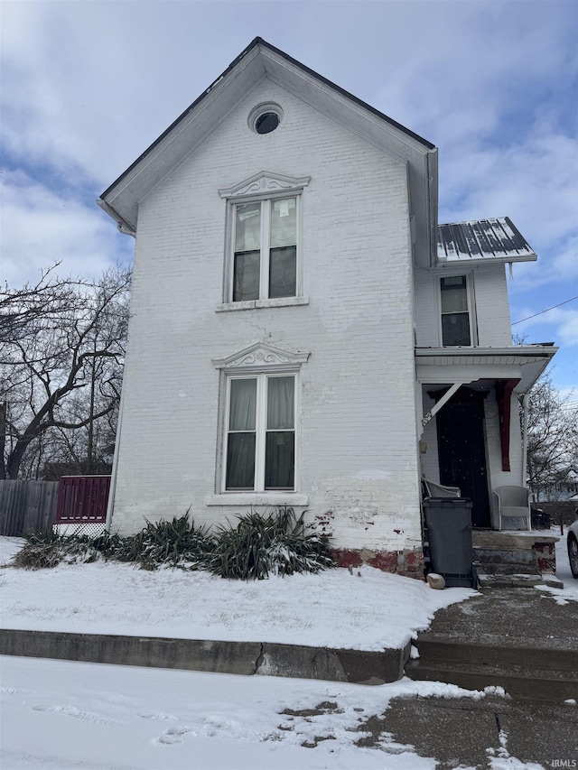 view of snow covered property