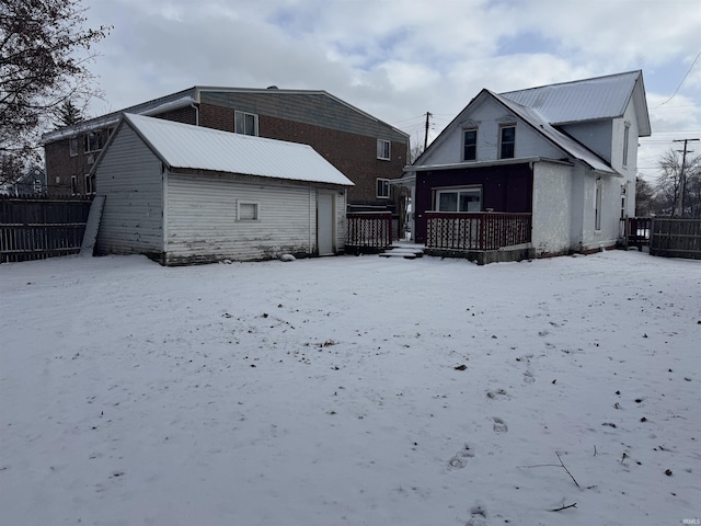 view of snow covered house