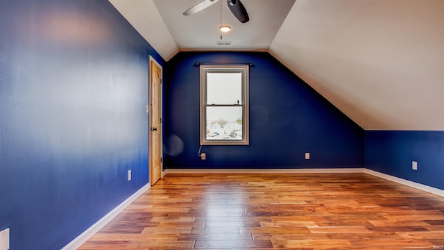 bonus room featuring ceiling fan, lofted ceiling, and hardwood / wood-style floors