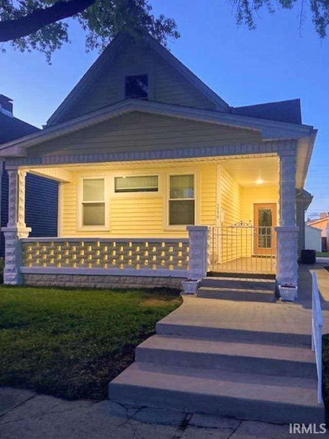 view of front of home featuring covered porch