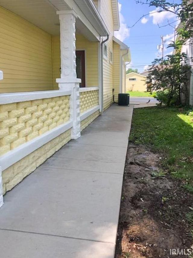 view of property exterior featuring a yard