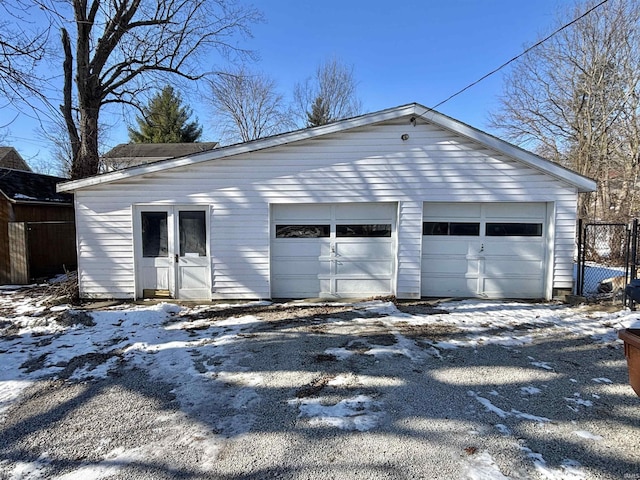 view of snow covered garage