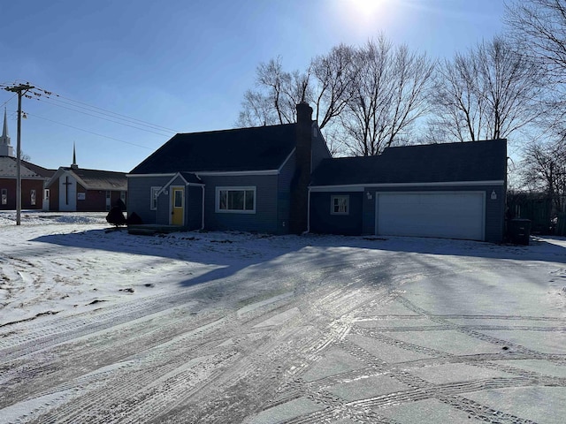 view of front of home with a garage