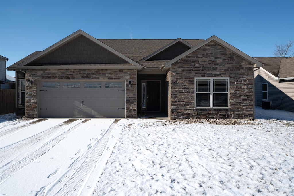 view of front of property with a garage