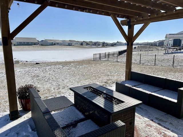 view of patio with a fire pit