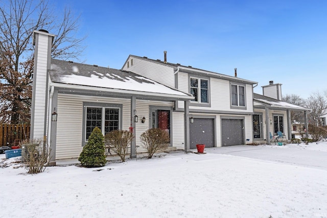 view of front of property with a garage