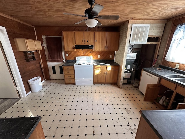 kitchen featuring wood ceiling, white appliances, brick wall, and wooden walls