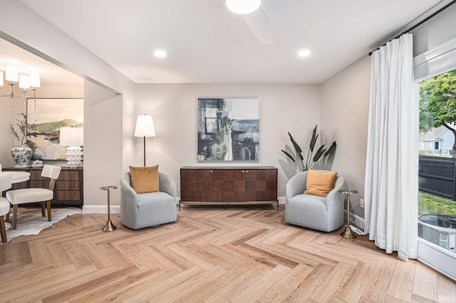 sitting room featuring light parquet floors