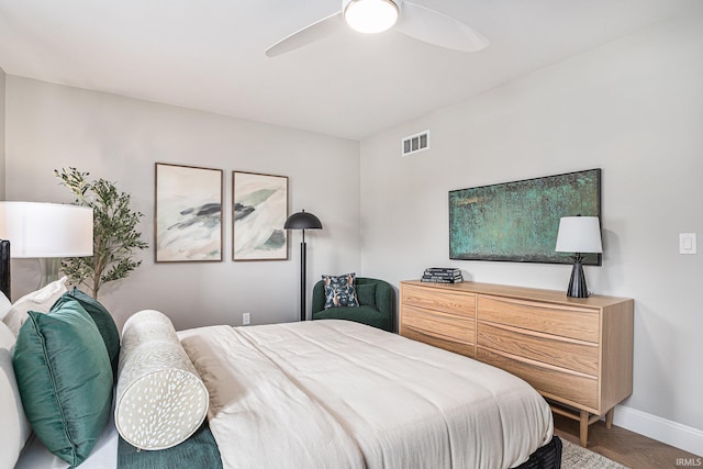 bedroom featuring parquet floors and ceiling fan