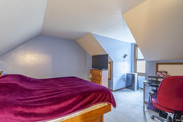 carpeted bedroom featuring lofted ceiling and a textured ceiling