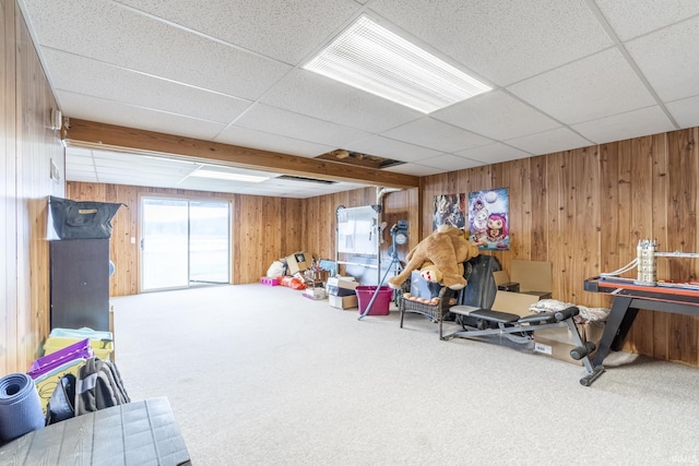 game room featuring a paneled ceiling and carpet flooring