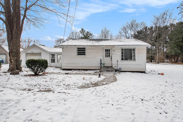 view of snow covered house