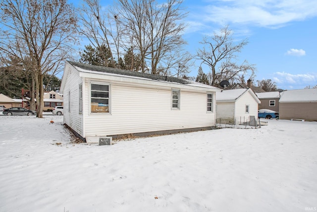 view of snow covered property