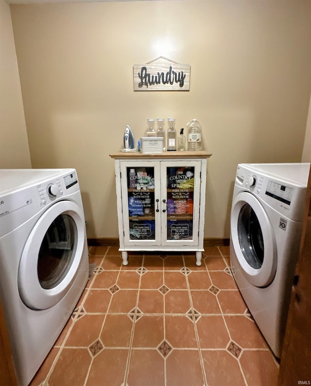 laundry area featuring separate washer and dryer and tile patterned flooring