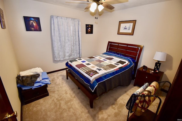 bedroom with light colored carpet and ceiling fan