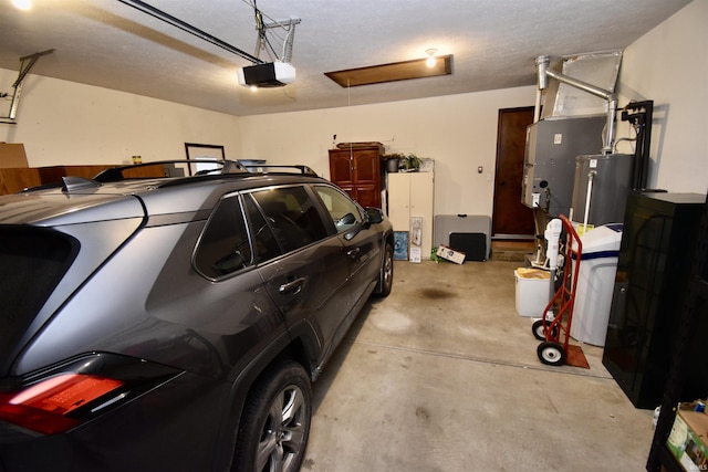 garage featuring a garage door opener and gas water heater