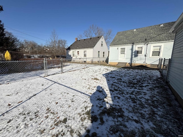 view of snow covered house