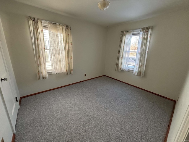 view of carpeted spare room