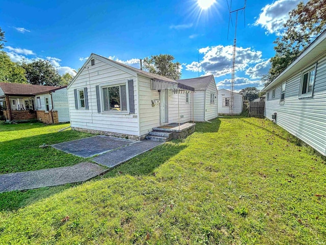 exterior space with a lawn and a patio area