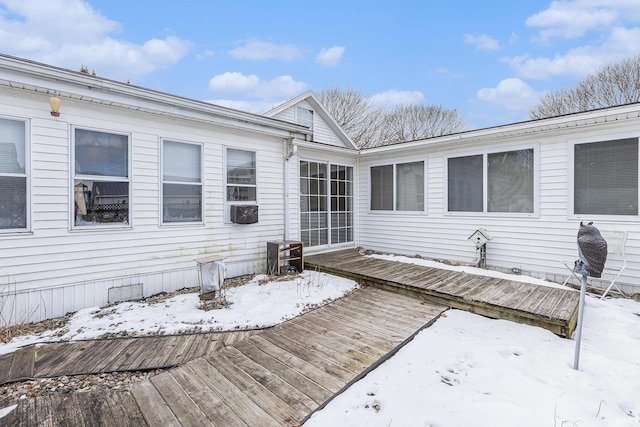 view of snow covered deck