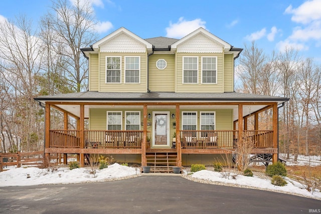 farmhouse inspired home with covered porch