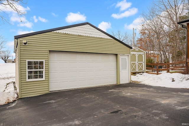 view of snow covered garage