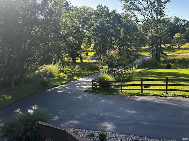 view of home's community featuring a yard