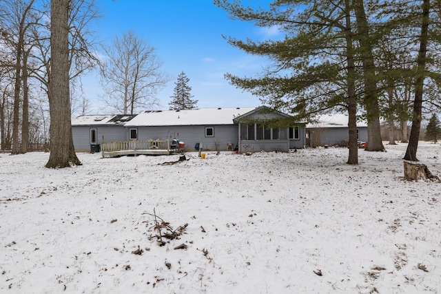 view of snow covered house