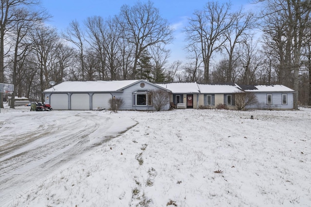 ranch-style house featuring a garage