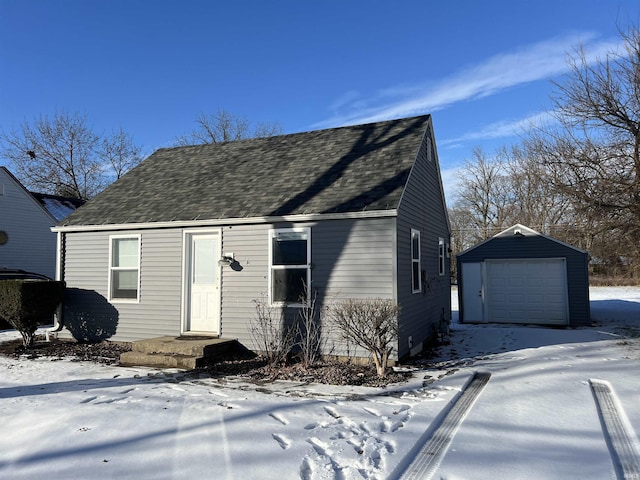 view of front of home featuring an outbuilding and a garage