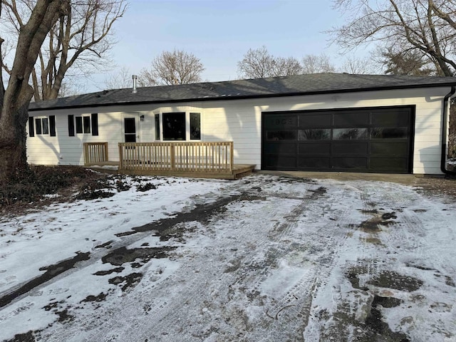 single story home featuring a garage