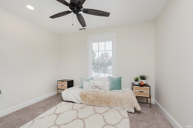 carpeted bedroom featuring ceiling fan