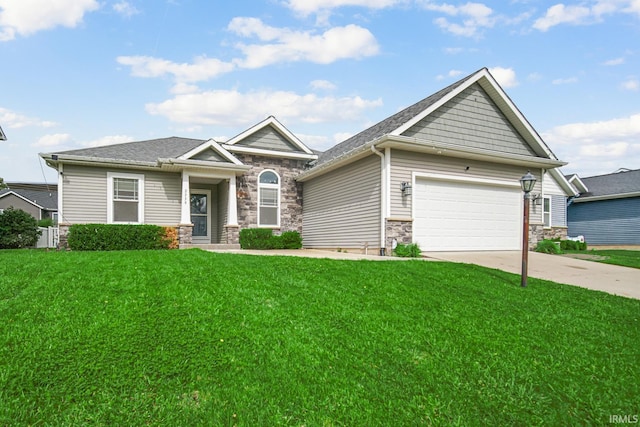 craftsman-style home with a garage and a front yard