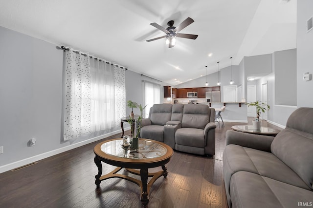 living room with ceiling fan, dark hardwood / wood-style floors, and vaulted ceiling