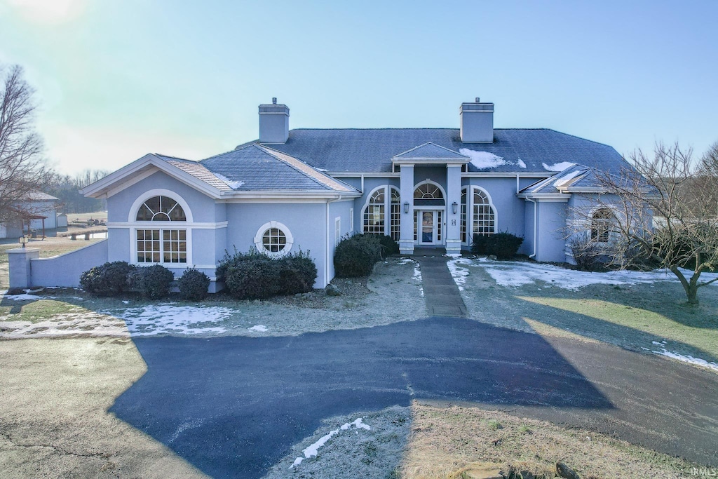 single story home featuring french doors