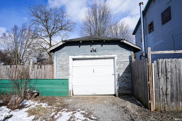 view of snow covered garage