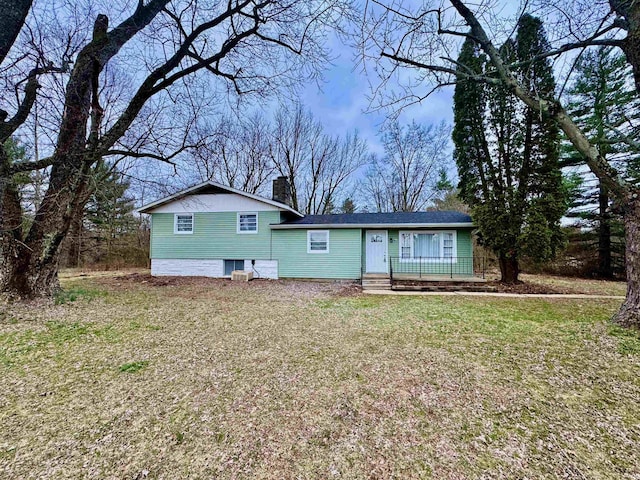 ranch-style home with a front yard