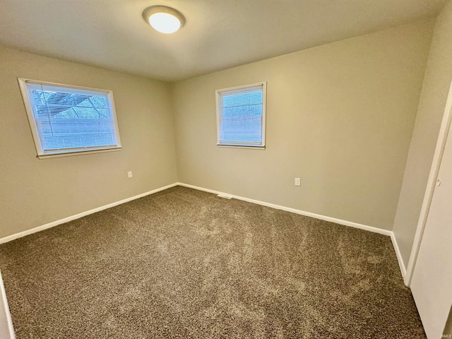 view of carpeted spare room